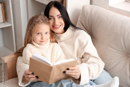 Young mother and her little...