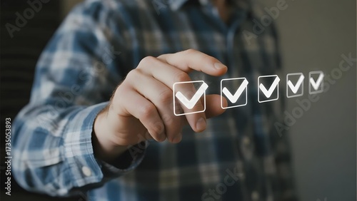 Person interacting with digital checkmarks on a transparent screen