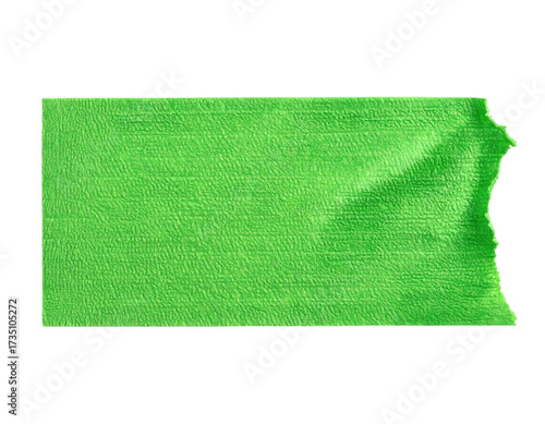 A bright green piece of textured tape with a torn edge on a black background