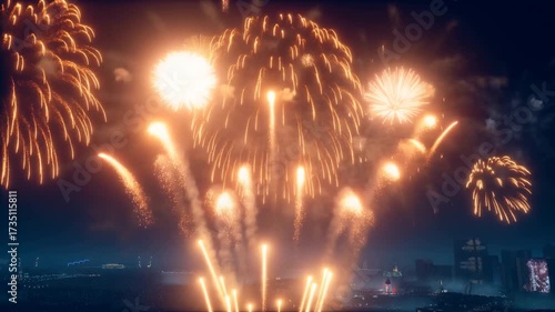 Spectacular fireworks display illuminating the night sky above a city skyline, creating a vibrant spectacle.