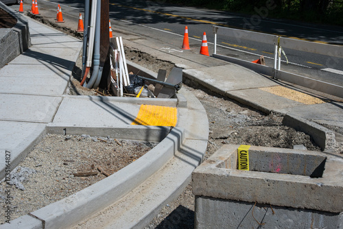 Obraz na płótnie Public road construction project, new sidewalk and retaining wall, ADA accessibl