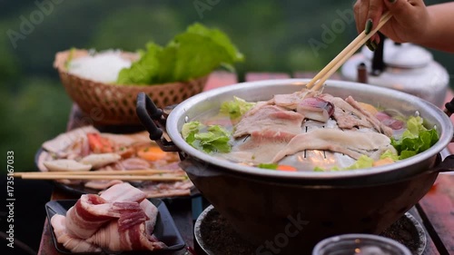 Pork BBQ with mountain view, Pork BBQ dinner with mountain view, cooking and eating Moo Kata, Thai barbecue grill pork with mountain view