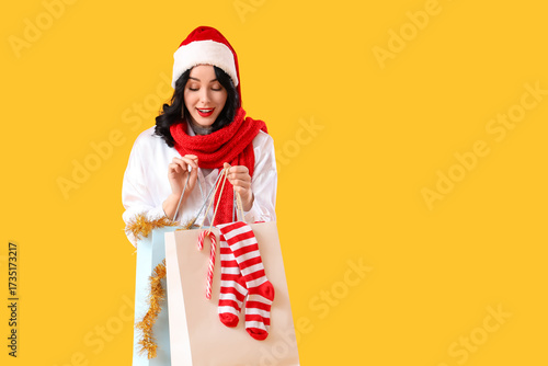 Pretty young woman in Santa...