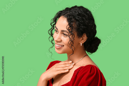 Smiling young woman with cu...