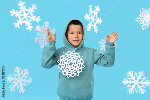 Cute little Asian boy with ...
