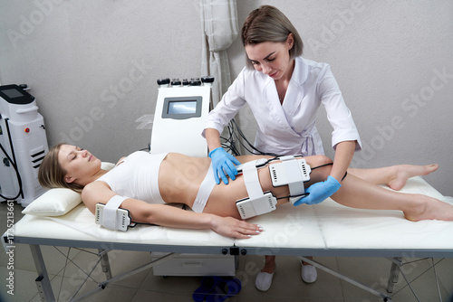 Photos Beautiful woman getting electro stimulation therapy