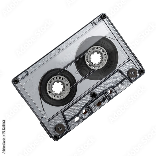 image of a compact cassette tape angled against a stark black background.