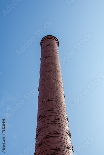 High factory pipe made of red brick