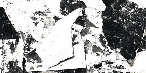 An abstract black and white texture, It has a fragmented, cracked, torn surface pattern, with irregular dark and light, The contrast black and white papercut creates a design.