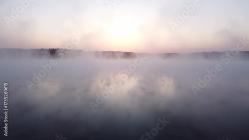 Wallpaper Mural Thick fog cloaks a vast, mystical lake at dawn, with ethereal mist gently drifting across the silent water ethereal mist, landscape, atmospheric Torontodigital.ca