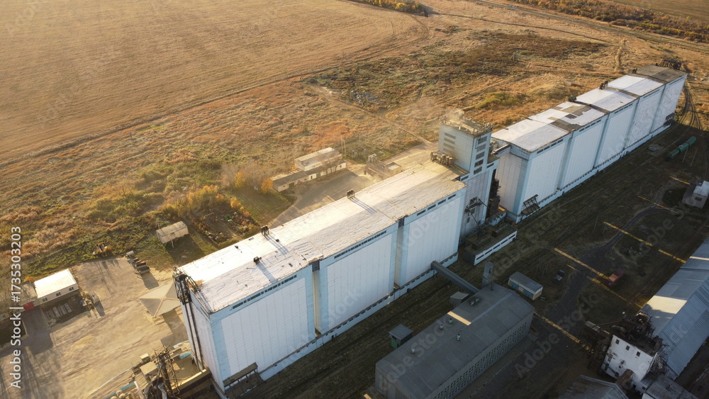 Fototapeta premium Aerial View of Massive White Grain Silo and Storage Complex