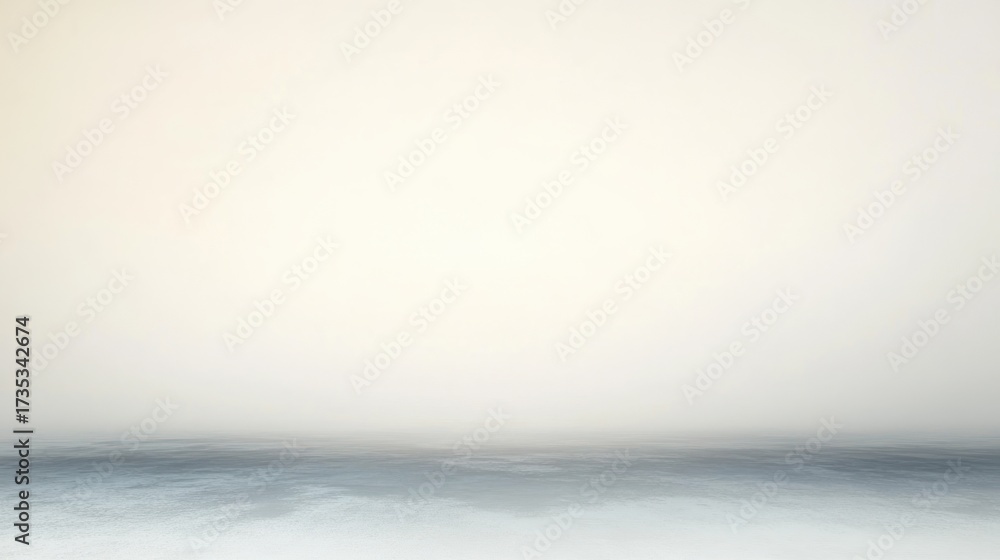 Obraz premium Calm and misty seascape with gentle waves blending into a soft, pale sky creating a serene and peaceful atmosphere