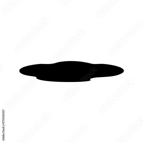Abstract black silhouette on a white background resembling a puddle or stain