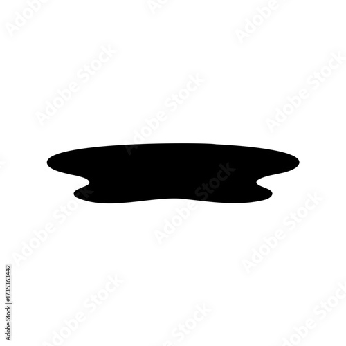 Black silhouette of an irregular shape like a puddle against a white background