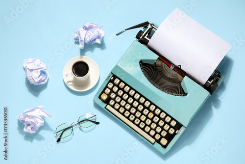 Vintage typewriter with cup...