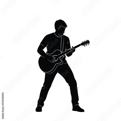 silhouette of a man playing guitar