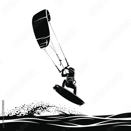 kite surfer jumping on a wave