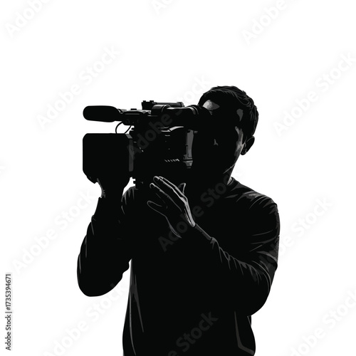 silhouette of a cameraman holding a video camera
