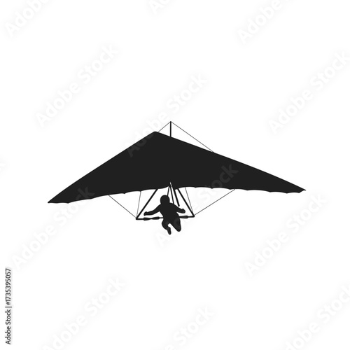 hang glider pilot silhouette flying in the sky