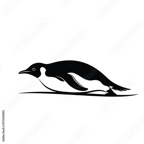 silhouette of a penguin swimming