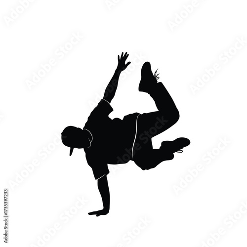 silhouette of a breakdancer