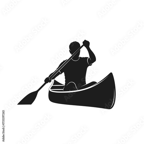 silhouette of a man canoeing