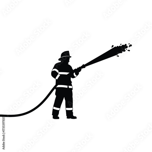 firefighter spraying water from a hose