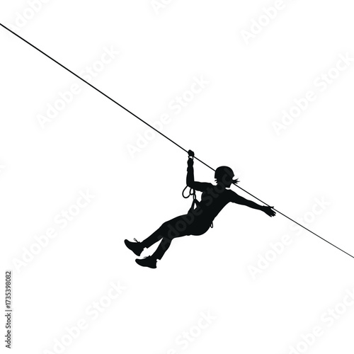 silhouette of a person ziplining