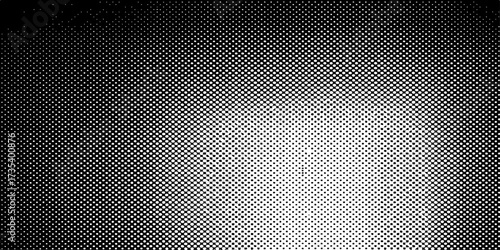 A seamless black metal mesh texture pattern with holes and steel fiber design for an abstract metallic background