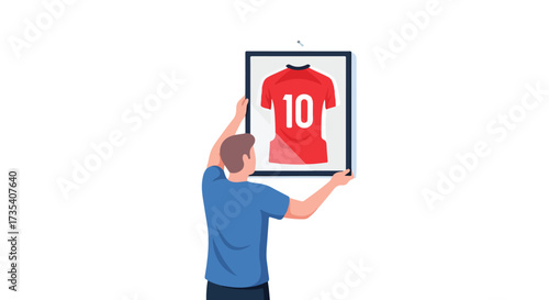 Admiring framed soccer jersey, symbolizing team spirit and passion for sports, a moment of nostalgic remembrance displayed proudly at home or in a