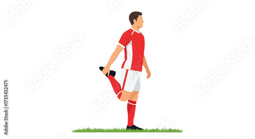 Athletic preparation: Young soccer player intensely warming up, stretching his quadriceps, preparing for a dynamic training session on green grass.