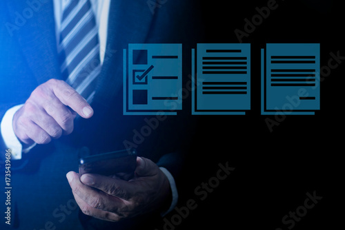 Businessman using pen to mark checkboxes, Performance checklist and tracking business performance, Online survey online exam Choosing the right answer in the exam.