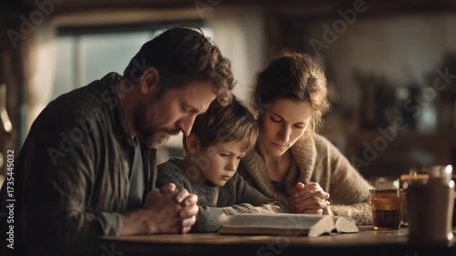 Family Prayer: A tender scene of a family engrossed in a moment of prayer, a picture of faith and love. Their reverent demeanor and the soft, warm lighting enhances the scene's spirituality.