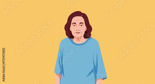 An elderly woman with short brown hair and wrinkles stands in front of a yellow background wearing a blue shirt.