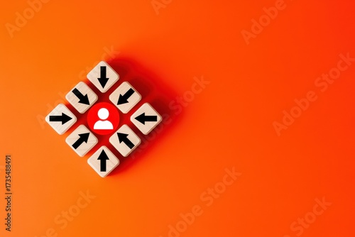 Business strategy concept with arrows on cubes pointing to a central red icon representing the target audience or customer focus