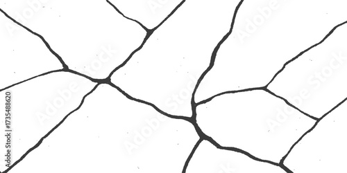 Old, cracked concrete wall texture with a broken glass shard in a hole in the wall for an abstract grunge background