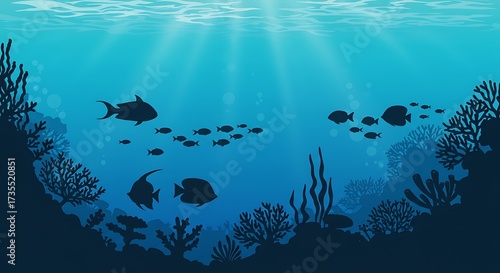 Fototapeta Naklejka Na Ścianę i Meble -  Underwater scene silhouetted fish and coral reefs in a bright blue ocean