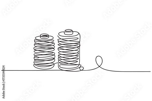 Spools of thread in one continuous line drawing vector illustration. one line Icon drawing with white background