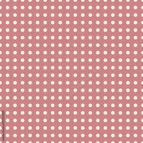 A seamless vector pattern featuring cream polka dots on a muted dusty pink grid background. Great for elegant designs, stationery, or packaging.