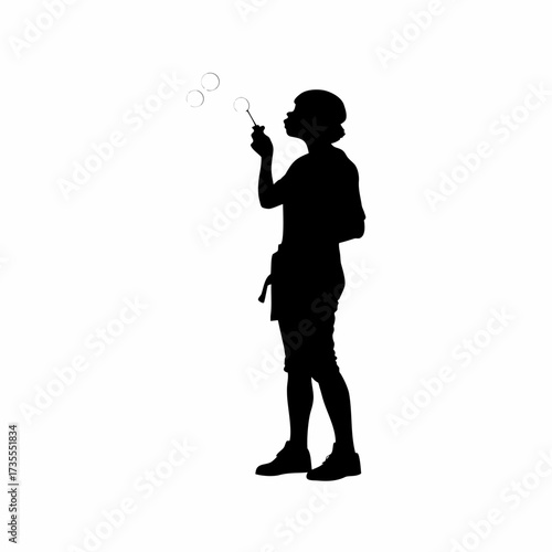 Silhouette of a caregiver blowing bubbles for children to chase isolated on white background