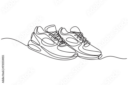 Vector illustration of sneakers sports shoes in a continuous one line. one line Icon drawing with white background