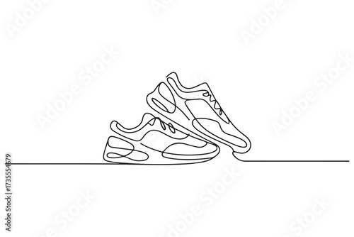 Vector illustration of sneakers sports shoes in a continuous one line. one line Icon drawing with white background