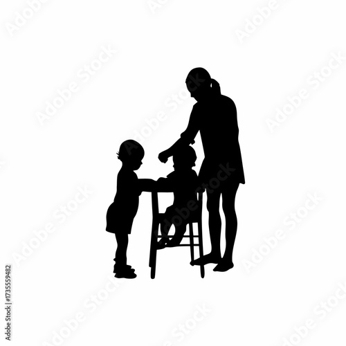 Silhouette of caregiver feeding two toddlers at a small table isolated on white background