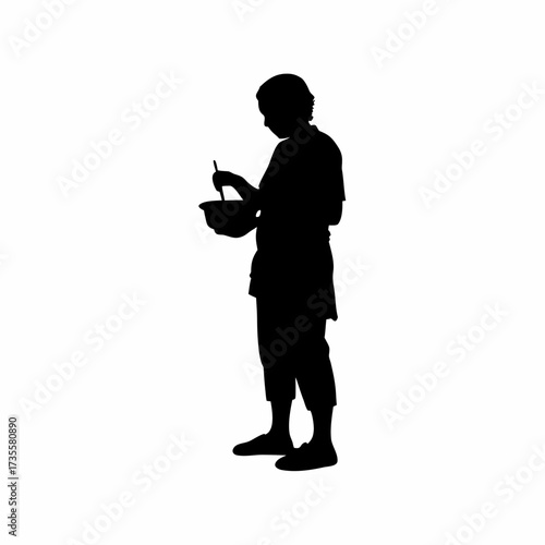 Silhouette of caregiver preparing baby food in a bowl isolated on white background
