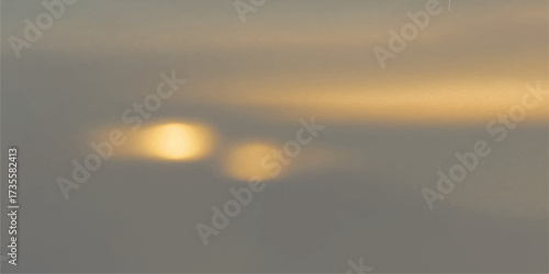 Golden light bathes the beautiful water landscape at dawn and dusk with fiery clouds on the horizon