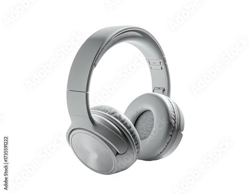 Angled shot of grey over-ear headphones isolated against a black background