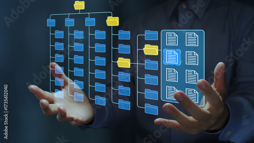 Document control and archive system. Document and record management. Business person holding file icon on folder structure.