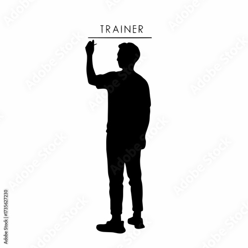 Silhouette of a trainer writing alphabets on a chalkboard in a rural hut isolated on white background
