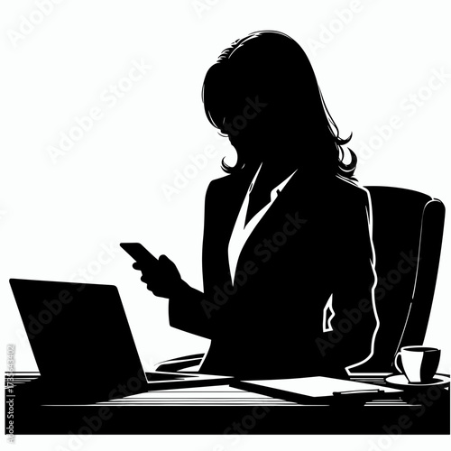 Silhouette of a businesswoman using a smartphone while sitting at a desk with a laptop and coffee