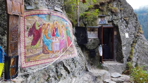 The cell of Saint Arsenie Boca in the Fagaras Mountains - Romania. It is a cave carved into the rock where the father retired as a hermit